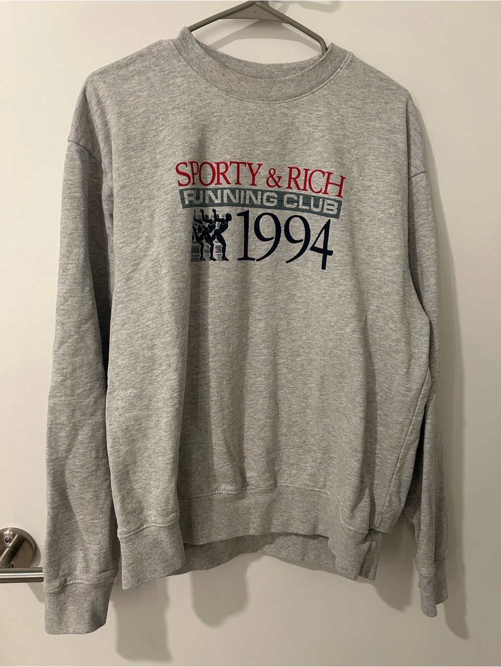 Sporty & Rich Gray Crewneck Sweatshirt with Red and Navy Graphics